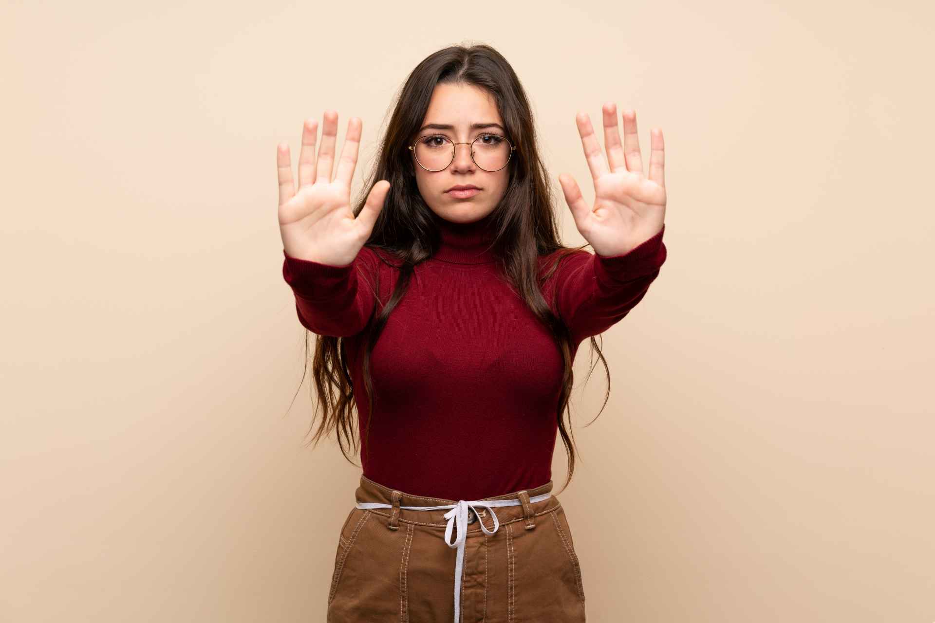 Teenage girl saying no stop Teenage girl saying no stop