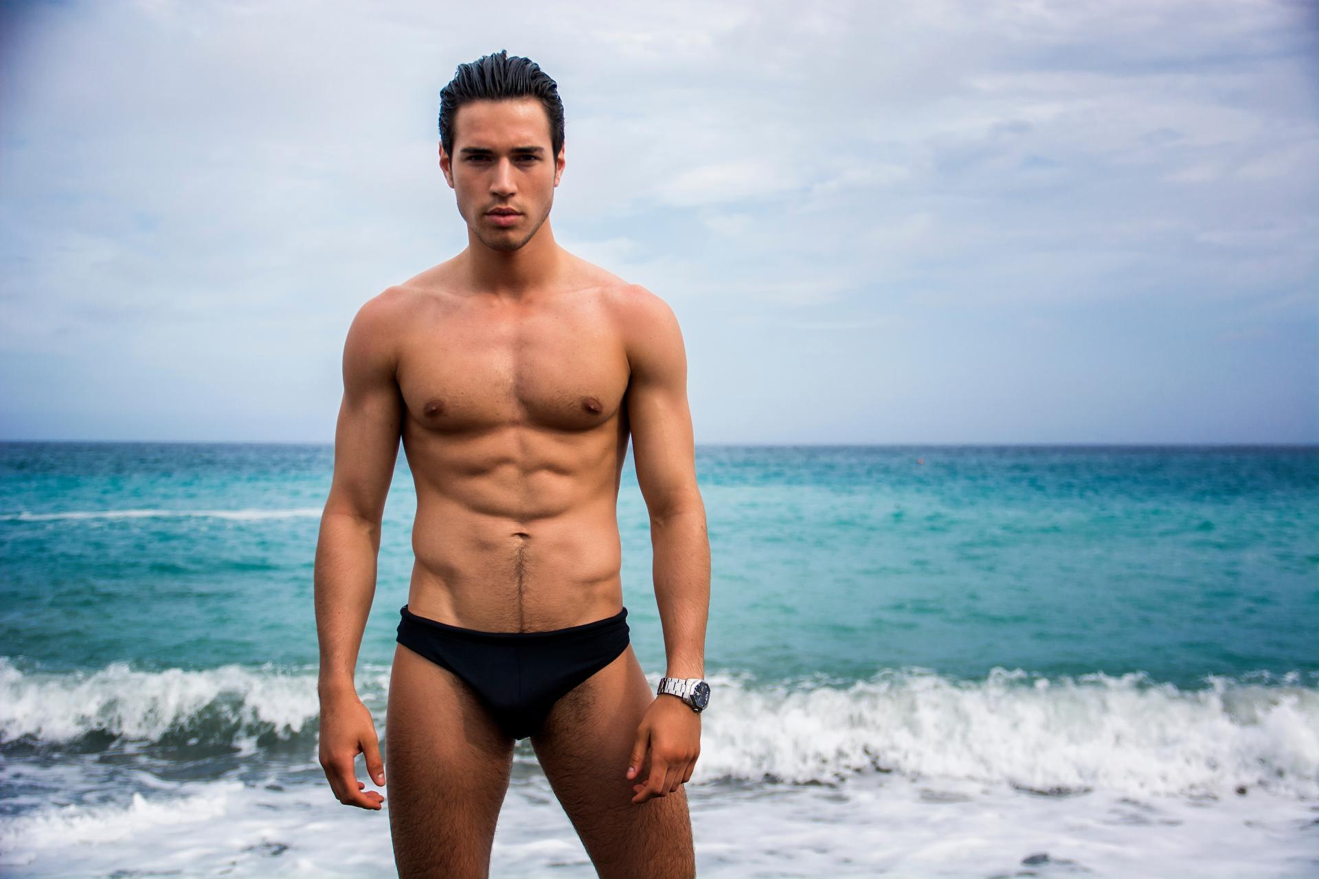 Athletic man on beach