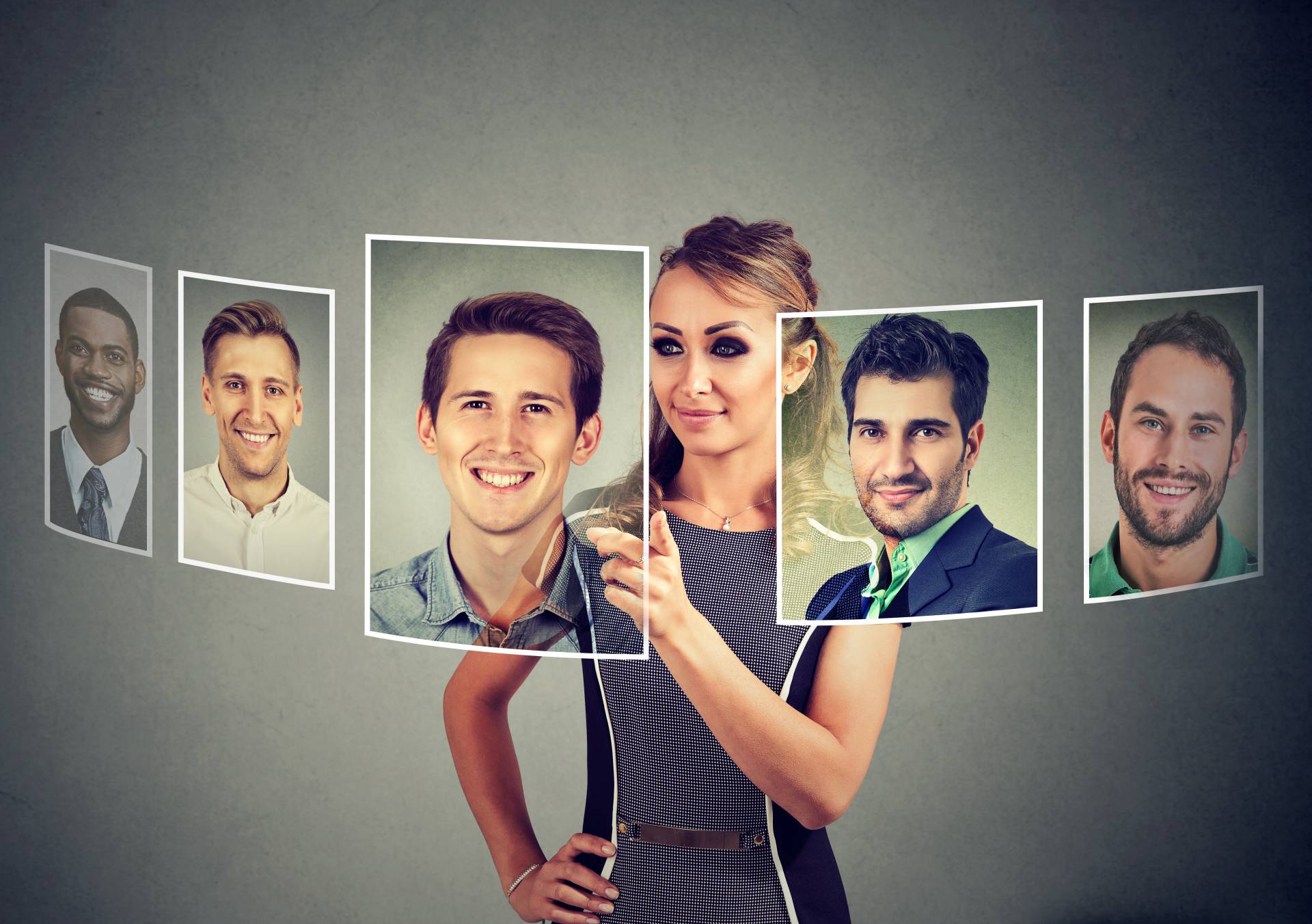 woman choosing a partner from a virtual slide show of male profile photos woman choosing a partner from a virtual slide show of male profile photos