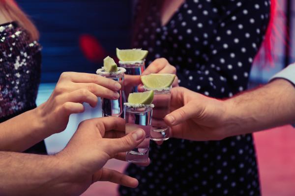 Four swingers doing shots at hotel takeover party Four swingers doing shots at hotel takeover party