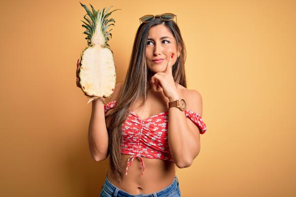 Inquisitive swinger woman with a pineapple Inquisitive swinger woman with a pineapple