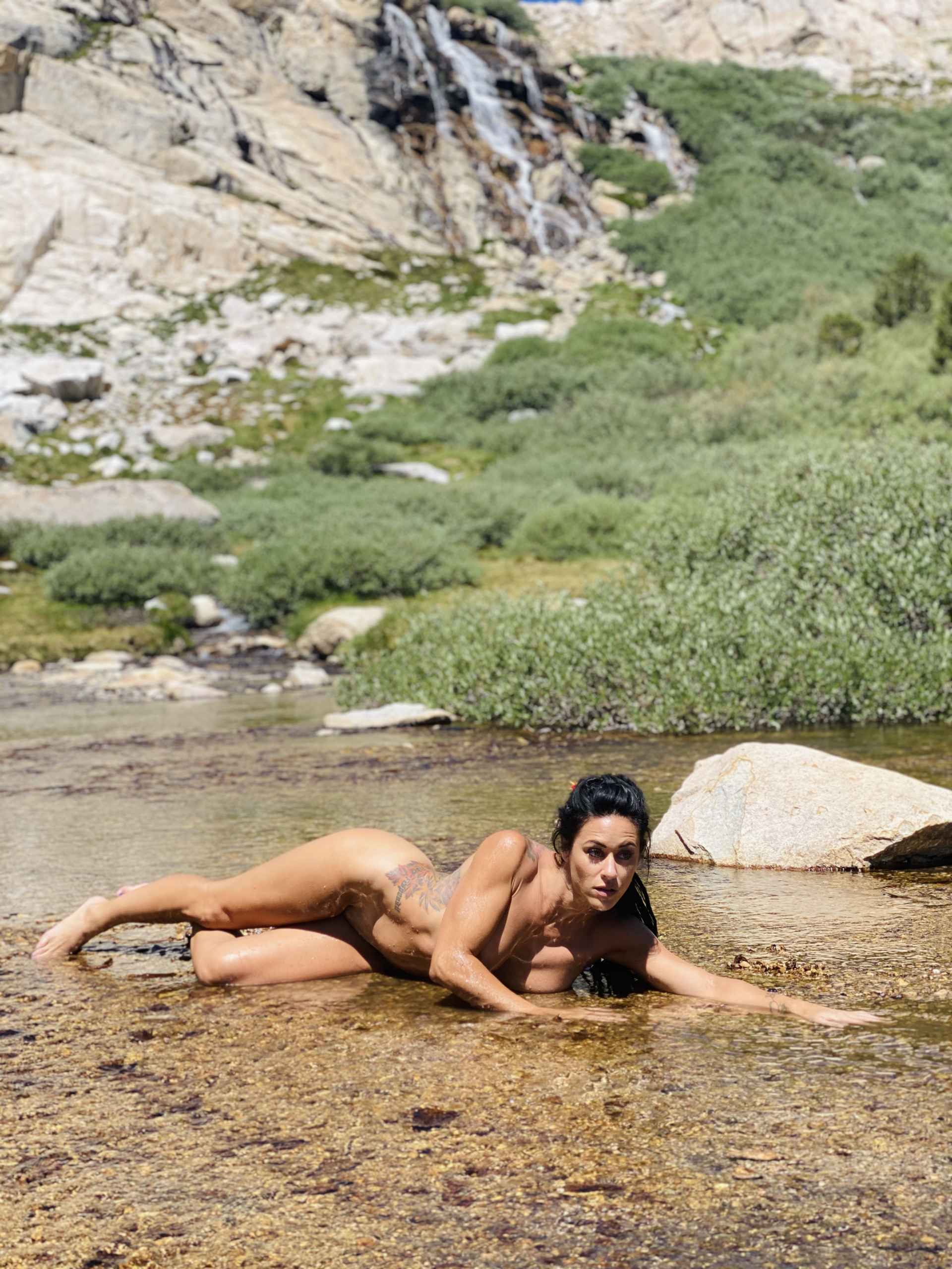 Aubrey Maverick naked in water