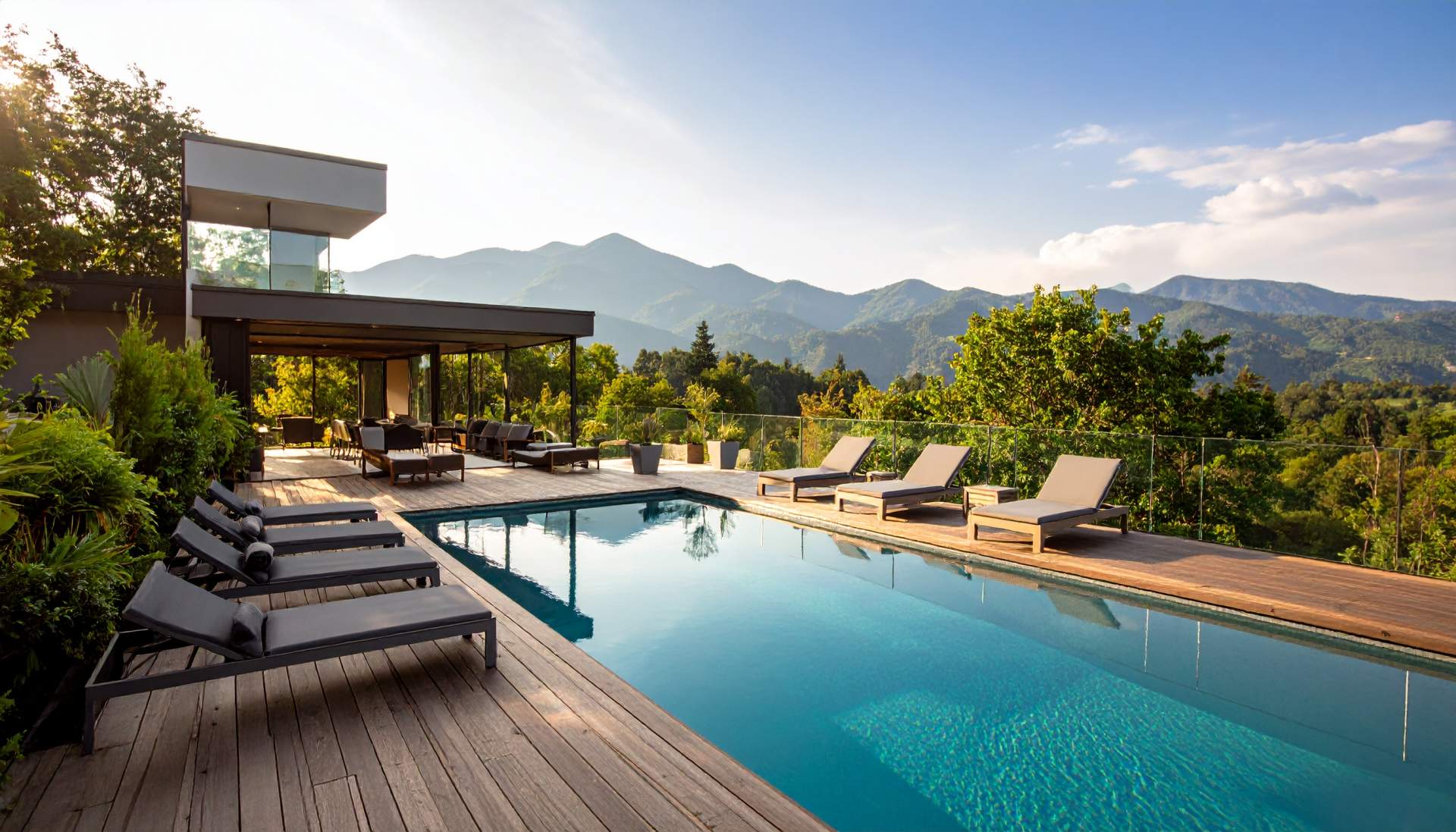 rooftop pool with forest mountains in the background rooftop pool with forest mountains in the background