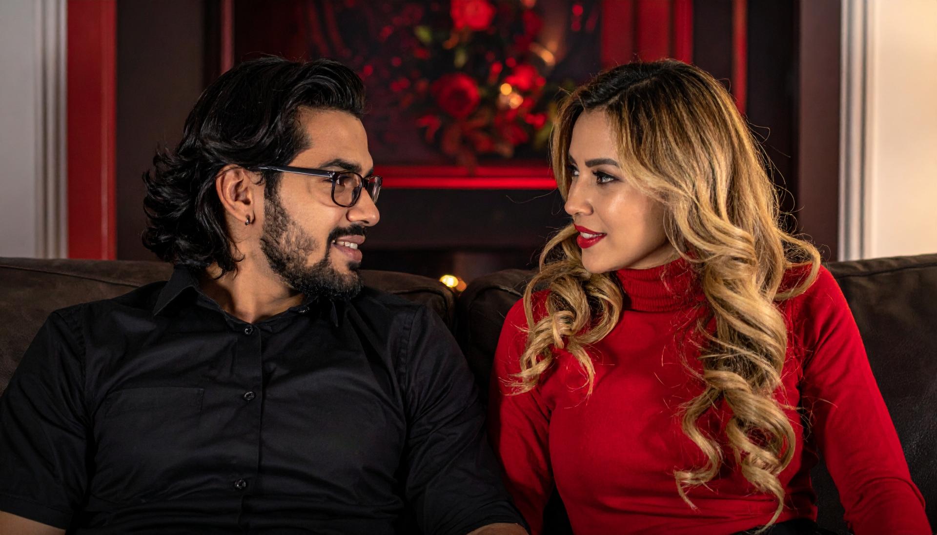 couple having a conversation while lounging on their couch