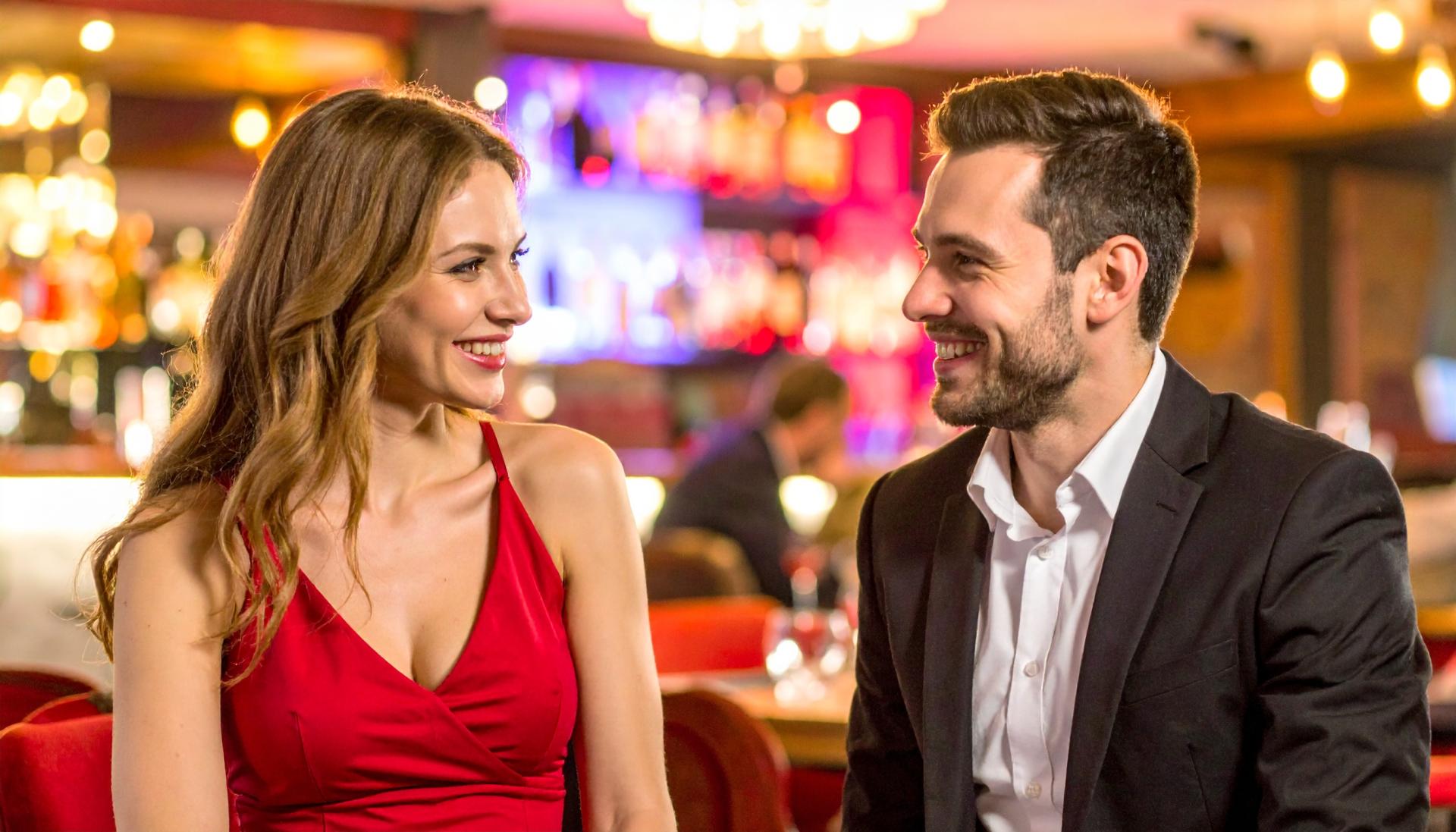 couple flirting at a night club