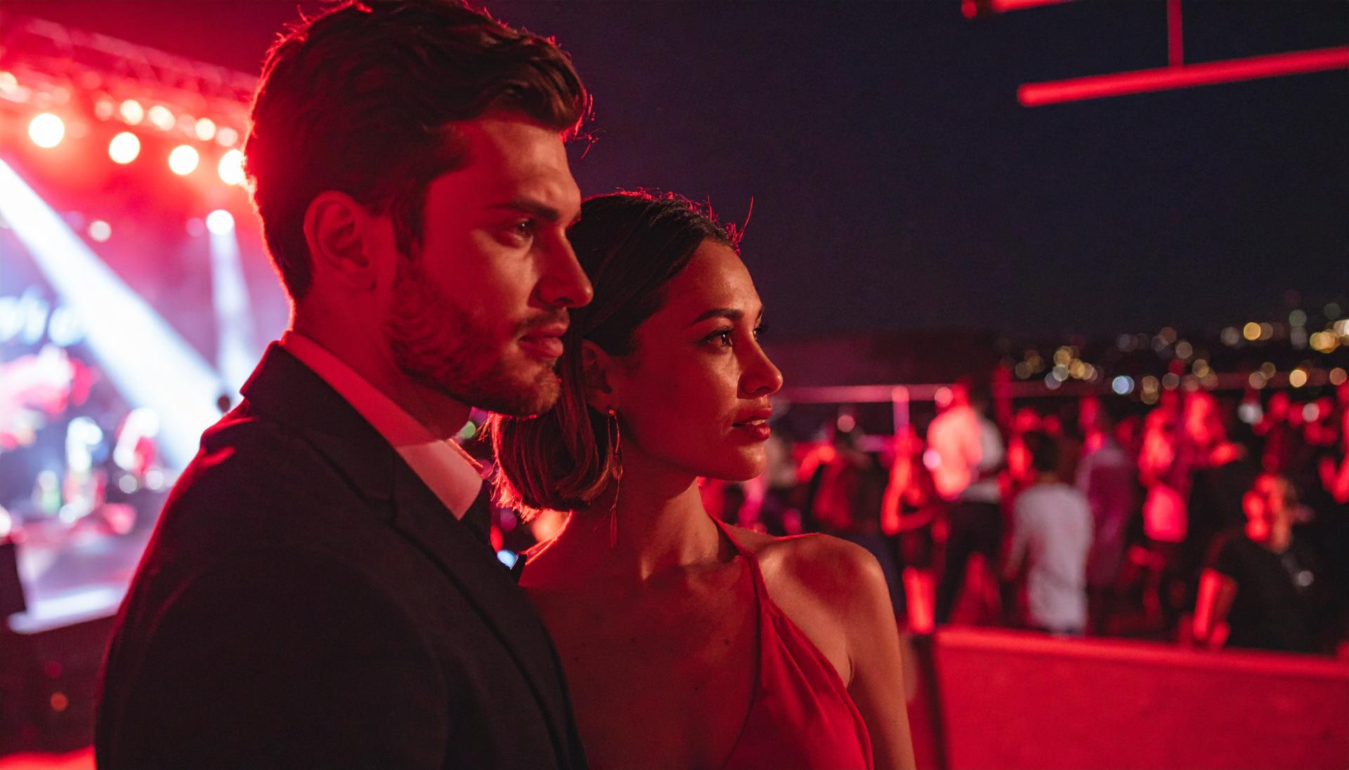couple at a nightclub with red lighting