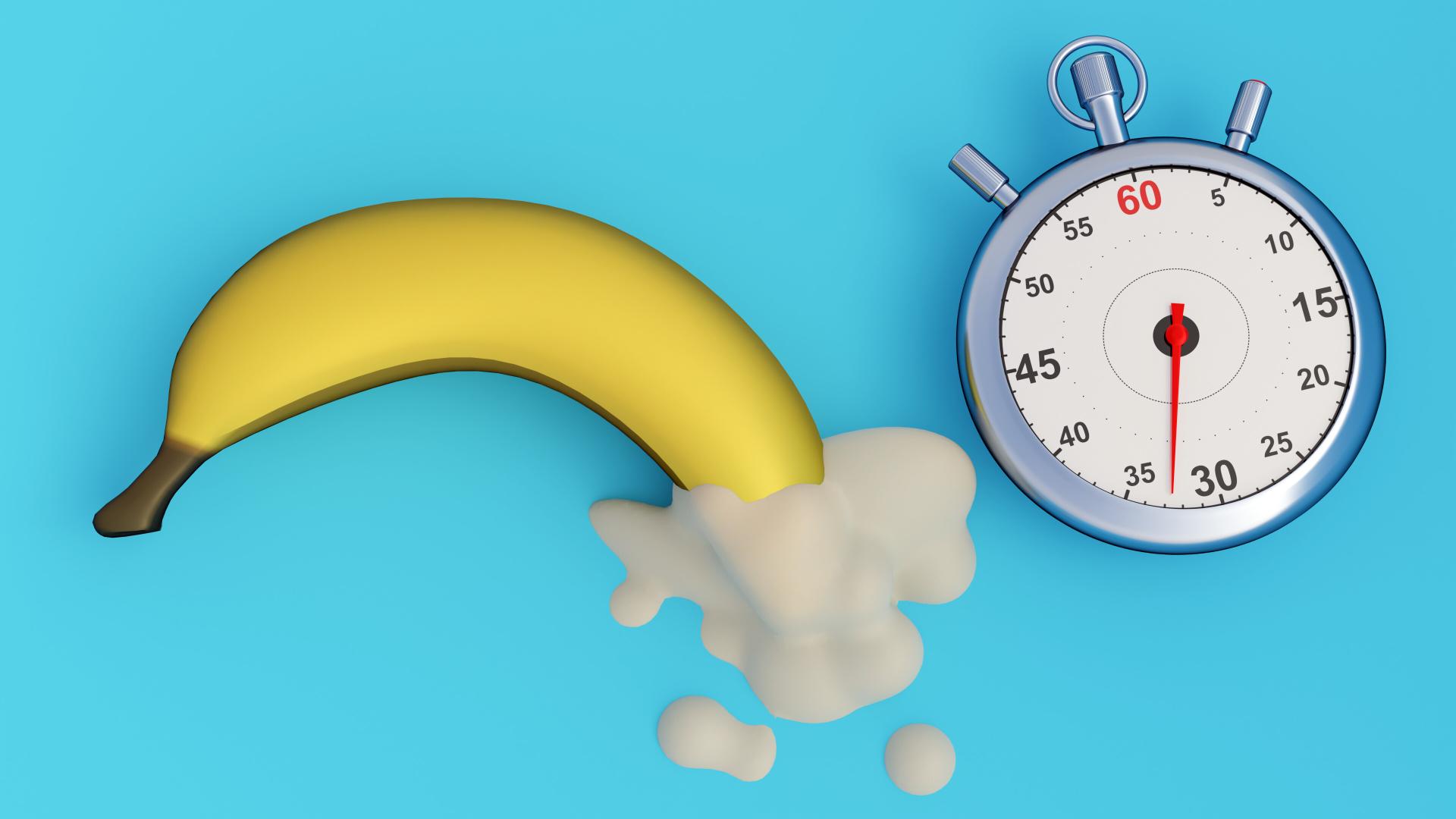 a banana with cream on the end of it and a stopwatch next to it