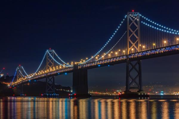 San Francisco Golden Gate Bridge at night with illuminated lights San Francisco Golden Gate Bridge at night with illuminated lights