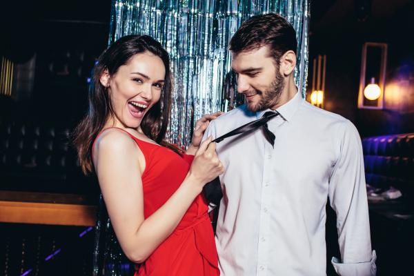 Playful Flirty Couple at a Swingers Party | SDC.com